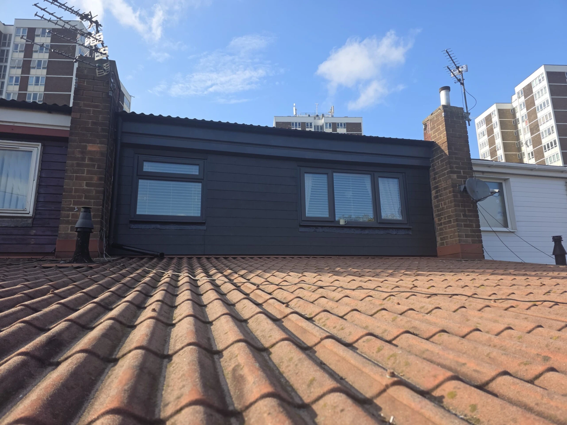 Replacement of Wooden Cladding with Anthracite Grey Composite Panels — completed work photograph